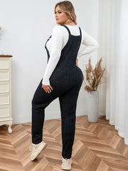 Straight-leg black denim jumpsuit in washed polyester-cotton blend