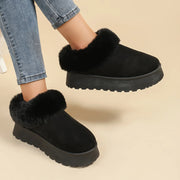 Slip-on snow boots with soft plush lining for warmth