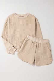 Textured quilted two piece set in warm parchment tone