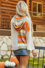 Oversized hooded sweater with bold colorblock knit design