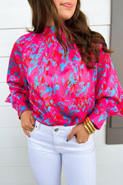 Purple printed bubble sleeve mock neck blouse with abstract all-over print
