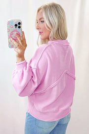 Pink sweater dress featuring balloon sleeves with ribbed cuffs