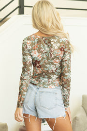 Green Floral Mesh Top with fitted second-skin silhouette and long sleeves