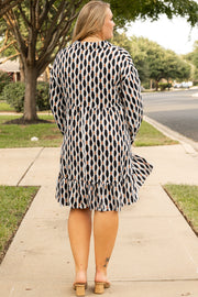 Geometric print plus size mini dress with long sleeves