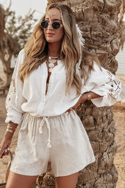 White Embroidered Button-Up Shirt with round crew neck and puff sleeve detail