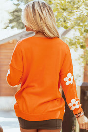 Floral knit cardigan with relaxed tunic-length loose fit
