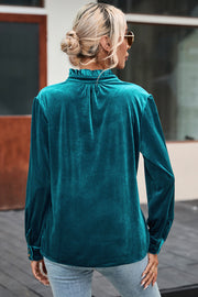 Burgundy velvet top in relaxed sheath silhouette