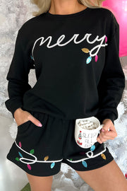 Black sequin pullover and shorts set with all-over glamorous shine