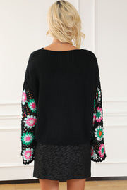 Black acrylic crochet sweater styled long as an easy sweater dress