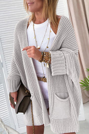 Gray oversized open front cardigan with relaxed tunic-length fit