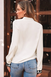 Floral embroidered long sleeve shirt with full button placket