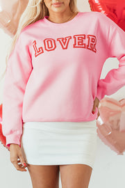 Pink LOVER puff print pullover styled for a Valentine's casual look