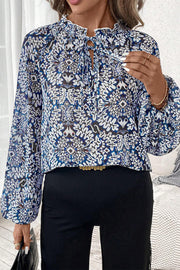 Blue tribal print puff sleeve blouse with lace-up V-neck