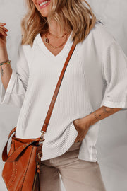 White V-neck casual top in medium-stretch fabric
