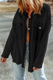 Long-sleeve black shacket styled open over a layering piece