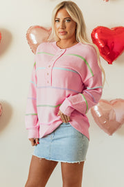 Long-sleeve pink striped Henley sweater in relaxed casual silhouette