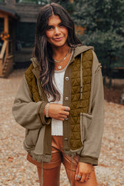 Quilted hooded jacket showing buttoned front closure and relaxed silhouette