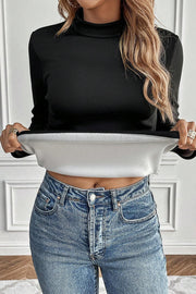 Black thermal long sleeve tee styled as a warm everyday basic