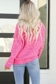 Relaxed-fit spotted V-neck sweater in breathable knit