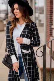 Casual black checkered cardigan with two roomy front pockets