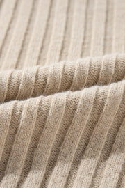 Colorblock cable knit crew neck showing back and long sleeve detail