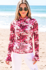 Floral flounce sleeve blouse paired with a midi skirt for daytime