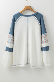 White long sleeve waffle knit top styled for everyday wear