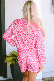Pink leopard satin long sleeve top with relaxed button-up fit