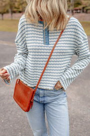 Sky Blue Stripe Henley top showing striped textured fabric and relaxed shift fit