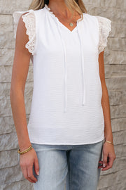 V-neckline textured blouse in 100% polyester fabric