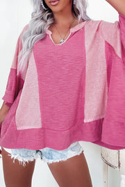 Bright Pink colorblock top showing relaxed shift oversize fit