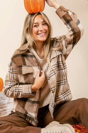 Flannel plaid shacket with long sleeves for cool-weather layering