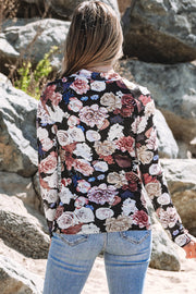 Floral mesh mock neck top showing slim sheath silhouette