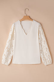 Lace blouse with hollowed lantern long sleeves and relaxed shift fit