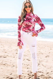 Stretchy mesh mock neck blouse with feminine flounce sleeve cuffs
