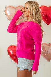 Heart Drop Shoulder Sweater showing long sleeves with ribbed cuffs