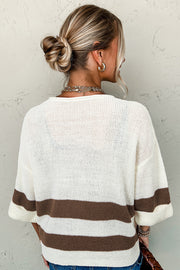 Brown striped cropped sweater showing loose slouchy fit