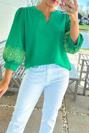 Green floral embroidered blouse in a relaxed shift fit