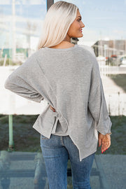 Casual crew-neck long sleeve top with tunic length coverage