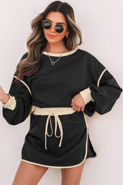 Color contrast pullover and skort set styled for casual daily wear
