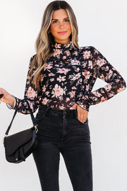 Black mesh mock neck top with delicate floral detail