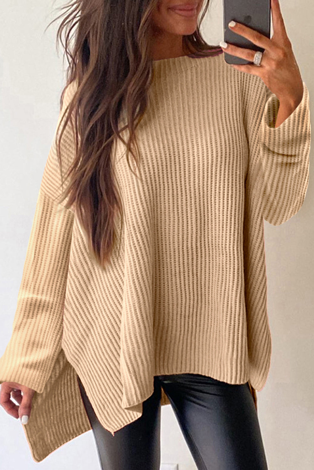Apricot cable knit drop shoulder sweater with loose crew-neck fit