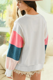 French Terry Color Block Top showing relaxed shift silhouette and long sleeves