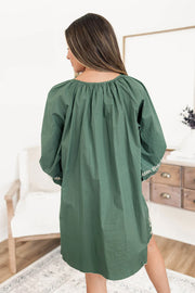 Boho floral shift mini dress showing long puff sleeves