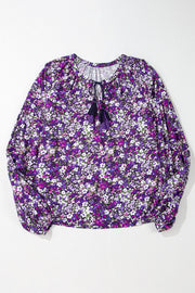Purple V-neck blouse with knot neckline detail