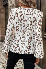 Leopard print balloon sleeve blouse showing pleated sleeve detail
