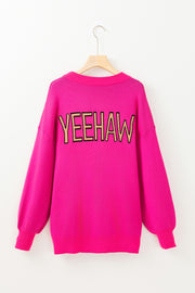 Oversized YEEHAW knit sweater in vibrant rose red viscose blend