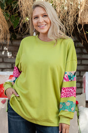 Green plus size patchwork print sweatshirt with leopard and leaf motifs