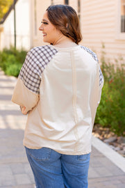 Beige graphic long sleeve top with mixed plaid and floral patch print
