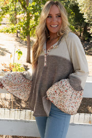 Bell sleeve patchwork top with raglan shoulders and flared cuffs